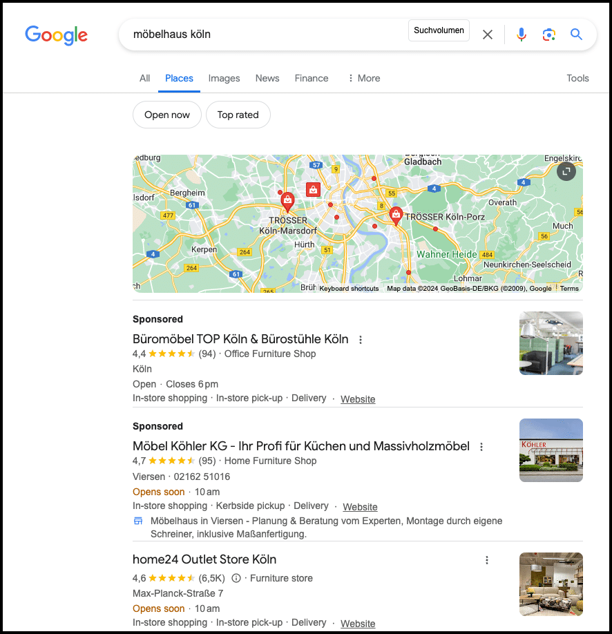 Google Maps zeigt gesponserte Standorte für Möbelgeschäfte in Köln.